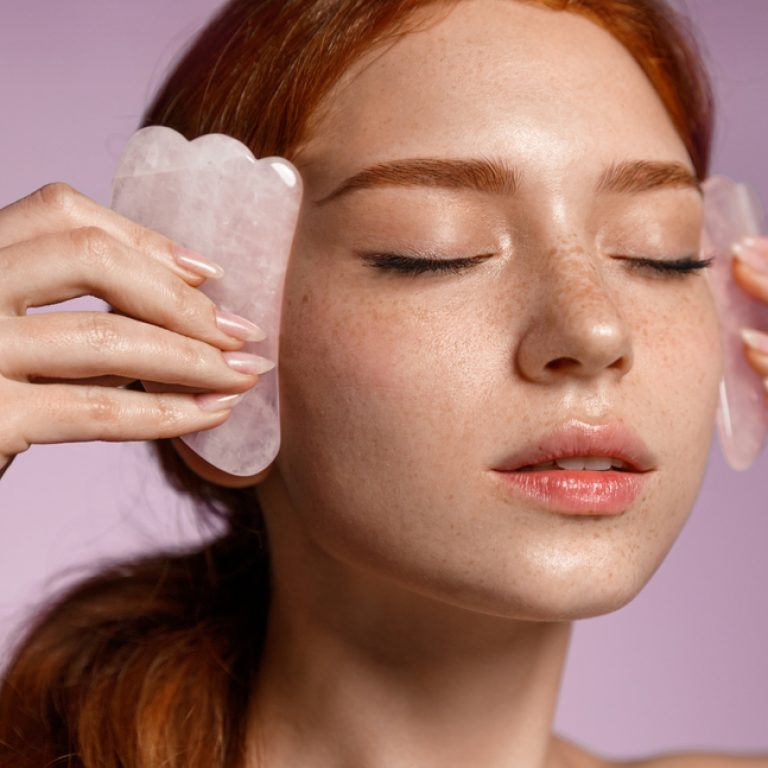 Close,Up,Portrait,Of,Beautiful,Redhead,Girl,,Ginger,Female,Massaging